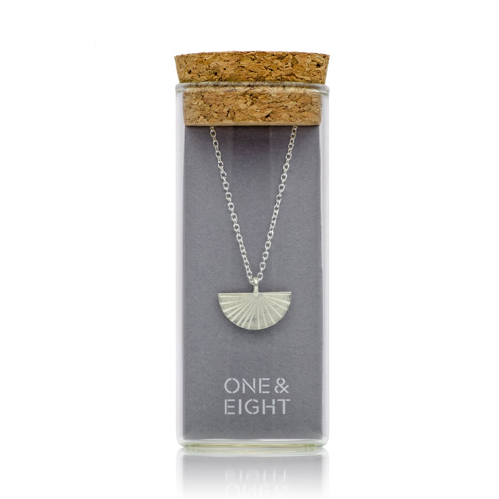 Silver pendant necklace fan shape in glass bottle